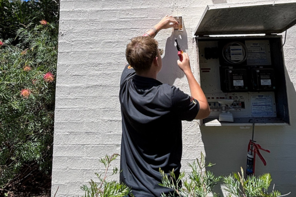 Powellect electrician completing residential electrical work at a Newcastle home